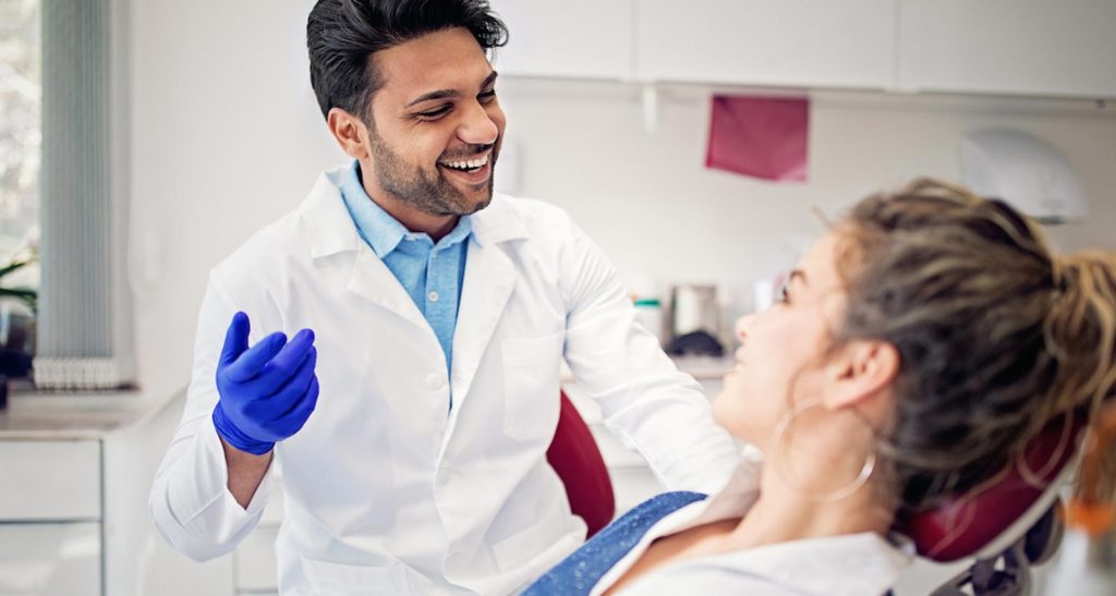 Woman sat in dentist chair